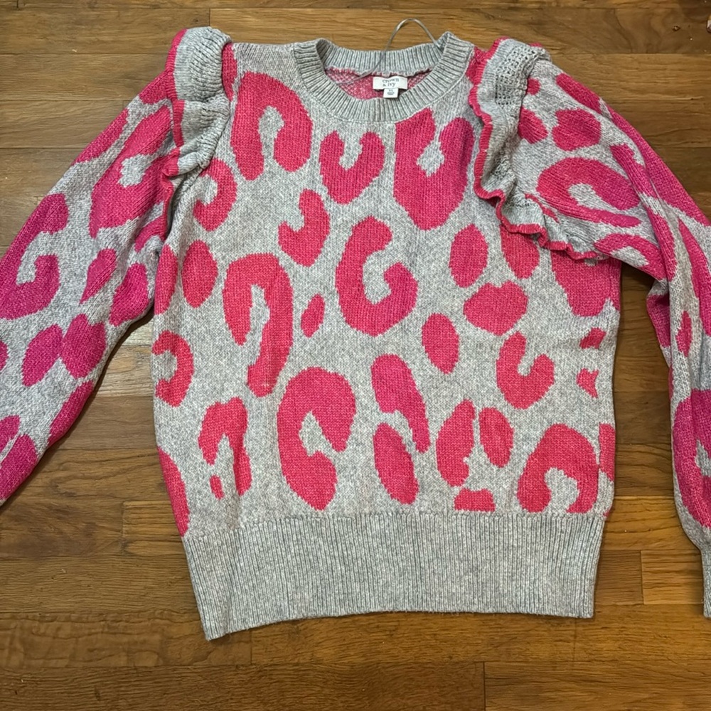 Pink and grey printed sweater.